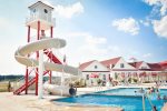 Coastal Club Features Many Pools in its water park including this huge slide
